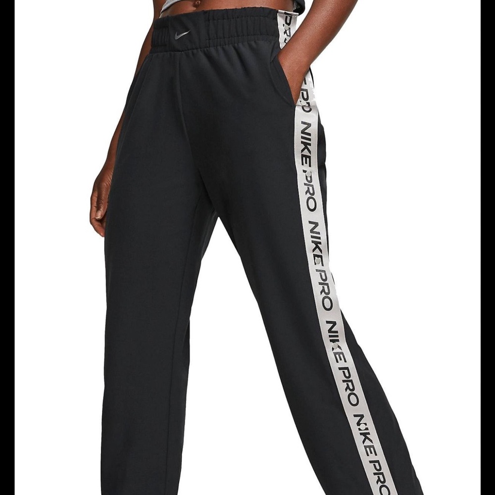 Nike Women's Black Track Pants with White Side Stripe
